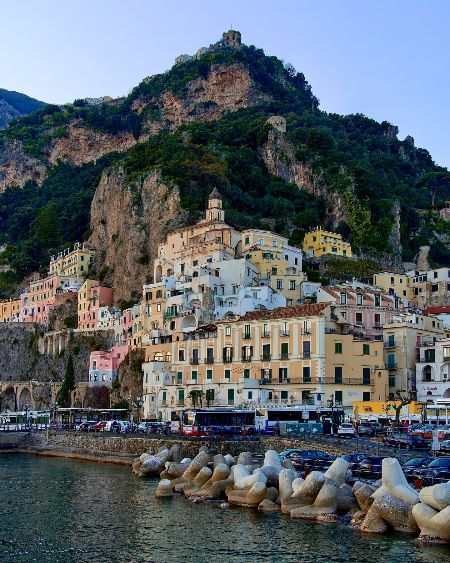 The Amalfi Coast completely blew me away and it’s one of those places that actually looks like the photos (or better!!). 😅 
So if you’re planning a trip to the Amalfi Coast, here are some top tips to keep in mind. Positano is the most famous town — it gets busy, so try to visit early to avoid the crowds. Amalfi is full of history, with a beautiful cathedral and cozy cafés, perfect for a relaxed afternoon. For something quieter, Ravello sits higher up with stunning gardens like Villa Cimbrone offering amazing views. A hidden gem worth checking out is Fiordo di Furore, a tiny beach tucked under a dramatic bridge, though it can be a bit tricky to reach. If you want a more local vibe, Praiano and Atrani are great spots, especially at sunset. 🌅 The best time to visit is May, June, or September — the weather is warm but the crowds are smaller. Driving the coast is an option if you’re comfortable with narrow, winding roads, or you can take a ferry for beautiful sea views. Whatever you do, bring comfy shoes because there are lots of stairs everywhere. The Amalfi Coast is truly unforgettable & full of beauty and charm! 🇮🇹🔆
#travel #travelinspiration