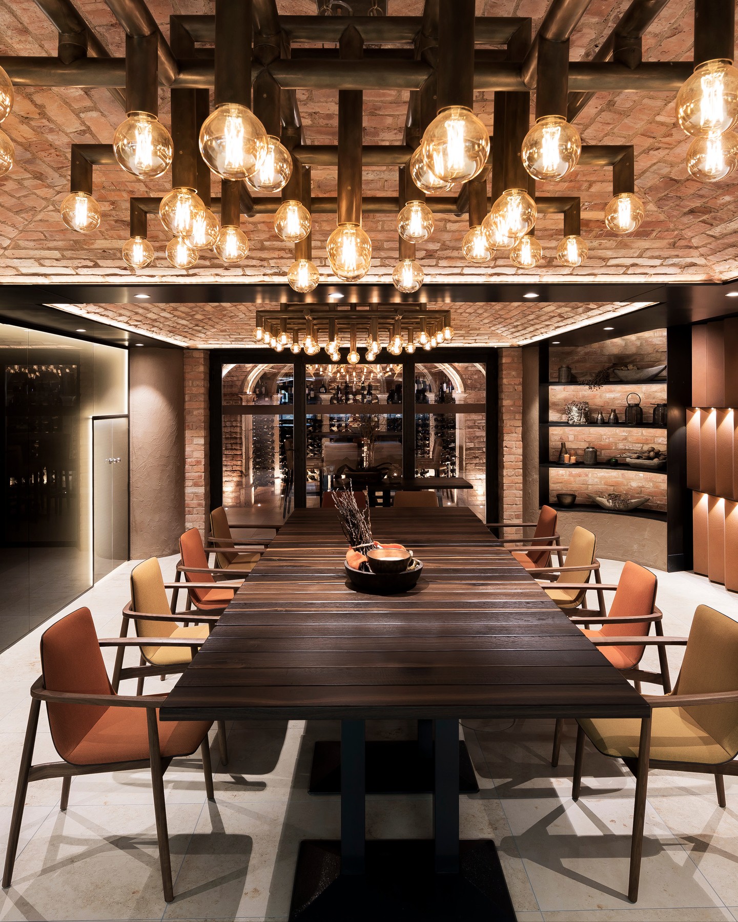 A space shaped by history and defined by detail.
The historic brick vaults set the tone for an intimate wine cellar where architecture remains the focal point. Carefully composed lighting enhances the depth and texture of the masonry, while custom-crafted furniture is designed to echo the room's unique form. The result is a harmonious balance of authenticity, craftsmanship, and understated luxury.
Designed in 2017, it remains timelessly elegant.
Neues Tor Bad Wimpfen, DE
#kitzigdesignstudios #kitziginteriordesign #interiordesign #winetime #winecellar #winery #restaurantdesign #wineexperinece